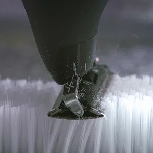 Image showing the trimmer cutting plastic bristles