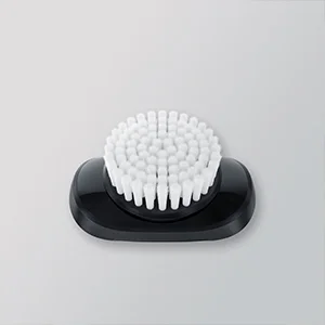 Braun cleansing brush head attachment, featuring white bristles on a black base.