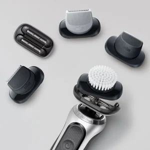 Braun Series 9 Pro shaver with multiple attachments including a trimmer, brush, and foil shaver head.