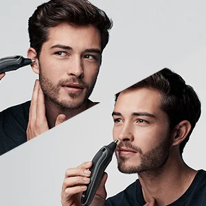Braun trimmer being used to trim nose and ear hair.