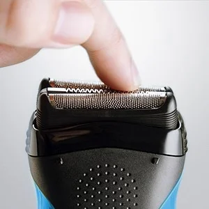 Braun shaver head with a finger demonstrating the flexible foil technology.
