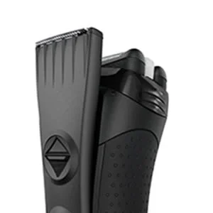 Braun trimmer close-up showing adjustable trimming comb attachment.