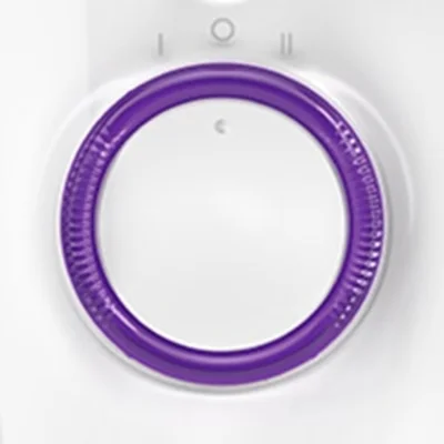Braun appliance control dial with purple ring, showing power settings.