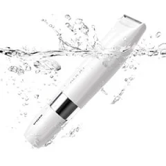Braun trimmer submerged in water, demonstrating its waterproof capability.