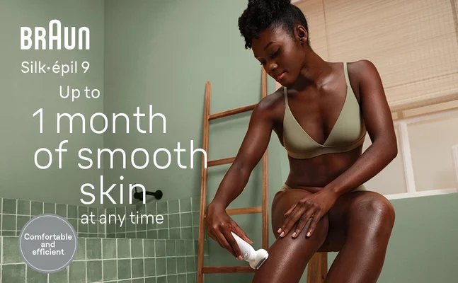 Black young woman using Braun Silk•épil 9 on her legs in the bathroom. Text reads Up to 1 month of smooth skin at any timeComfortable and efficient