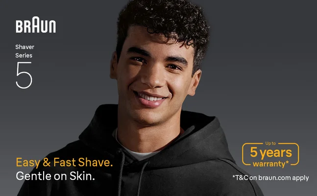 A smiling man with a shaved face. Text says: Easy and fast shave.