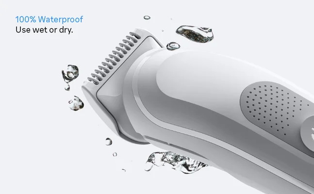 A man using the waterproof Braun body groomer 3 body comb to trim his armpit.