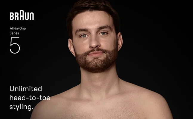 Young shirtless man with beard after using the Braun all in one trimmer kit Series 5