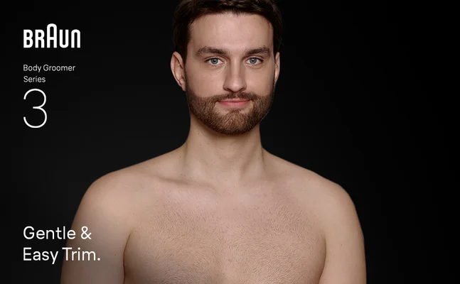 Young shirtless man after using the Braun Body Groomer Series 3.