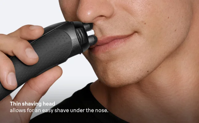Man using Braun Series 3+ with thin shaving head for an easy shave under the nose.