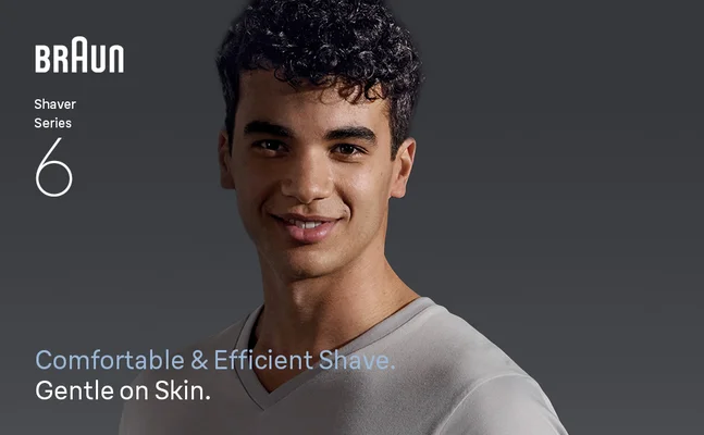 A smiling man with a shaved face. Text says: Comfortable & Efficient Shave.