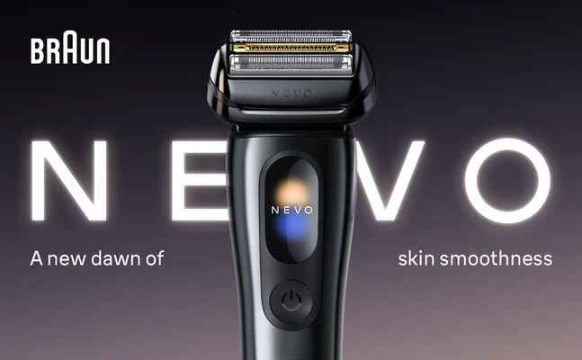 Braun NEVO electric shaver with illuminated logo on dark background.
