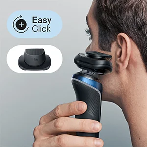 A man shaves his face with a black and blue electric shaver next to a charging base and a graphic bubble says Easy Click.