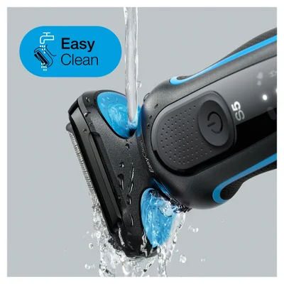 A black and blue electric shaver head is being rinsed under water with text Easy Clean and S5 visible on the shaver and text Easy Clean visible in a blue bubble.