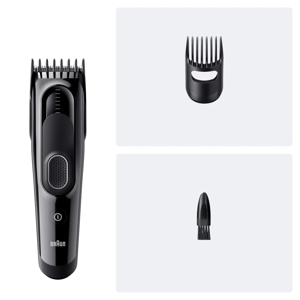 Braun hair clipper with comb attachment and cleaning brush.