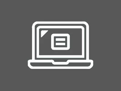 Image with grey background showing a white laptop