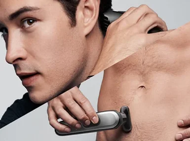 All-in-one Trimmers - Braun - man using Trimmer on his hair and torso