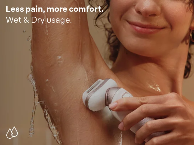 Woman epilating underarm in the shower. Less pain, more comfort. Suitable for wet or dry usage.
